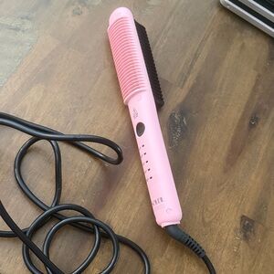Sleek Pink Hair Straightening Brush